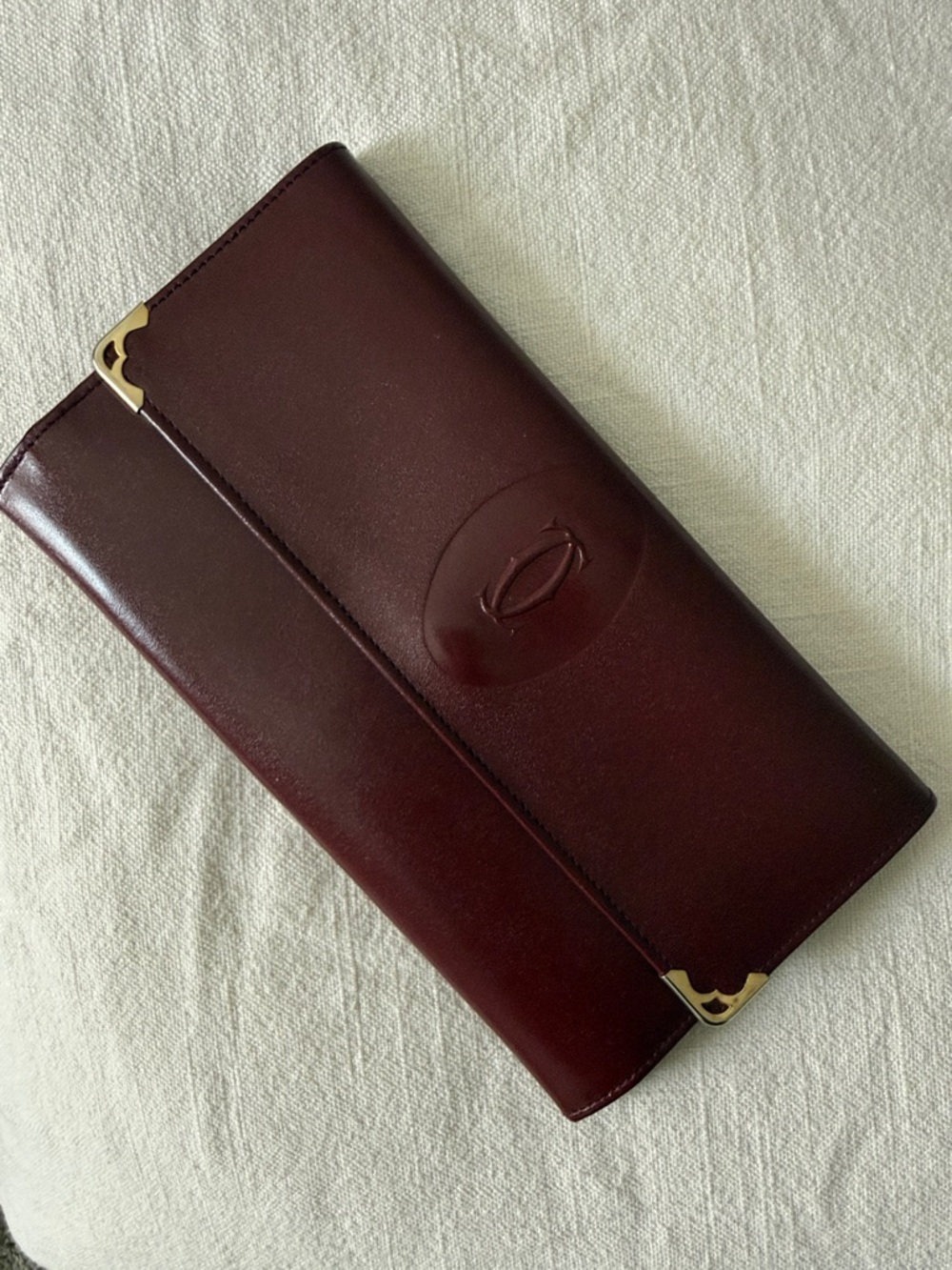Cartier Burgundy Leather Long Trifold Wallet with Gold Corners